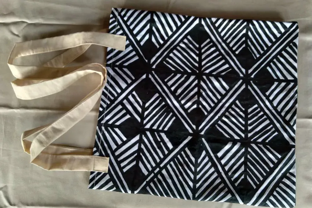 Fabric with a striped pattern painted in black